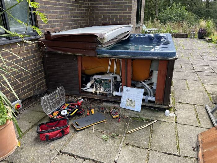Hot Tub Hero engineer carrying out a repair