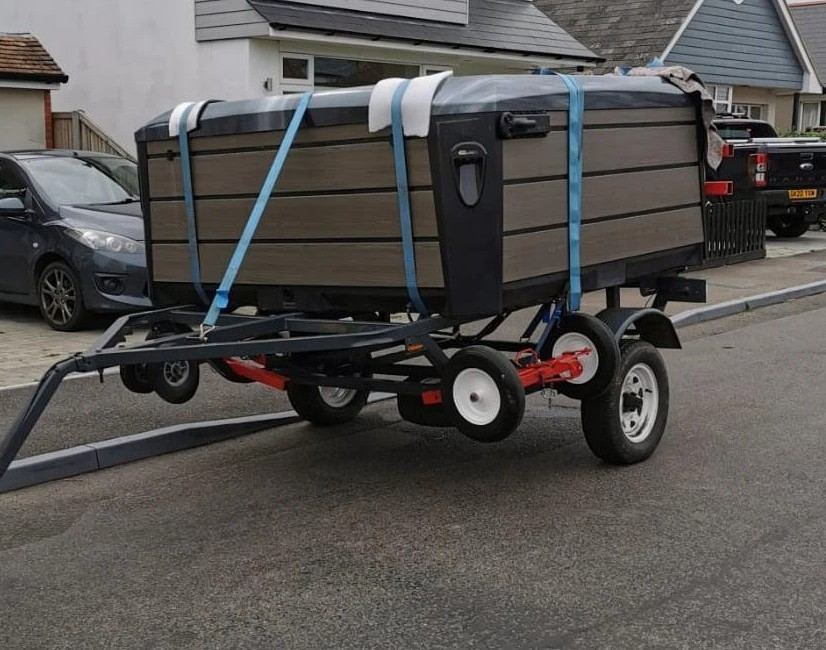 Hot tub being prepared for relocation